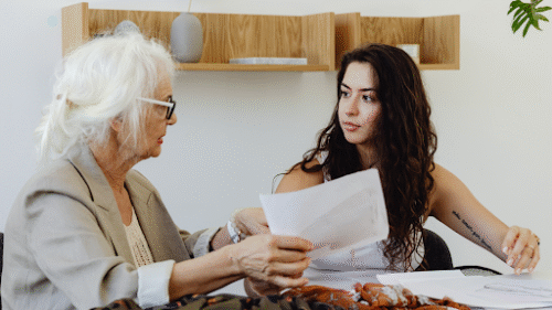 insurance adjuster reviewing personal injury claim documents at a desk