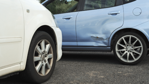 Injured person reviewing an insurance settlement offer while consulting with a personal injury lawyer in Florida