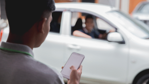 Car accident scene involving a rideshare vehicle representing Uber and Lyft liability in Florida